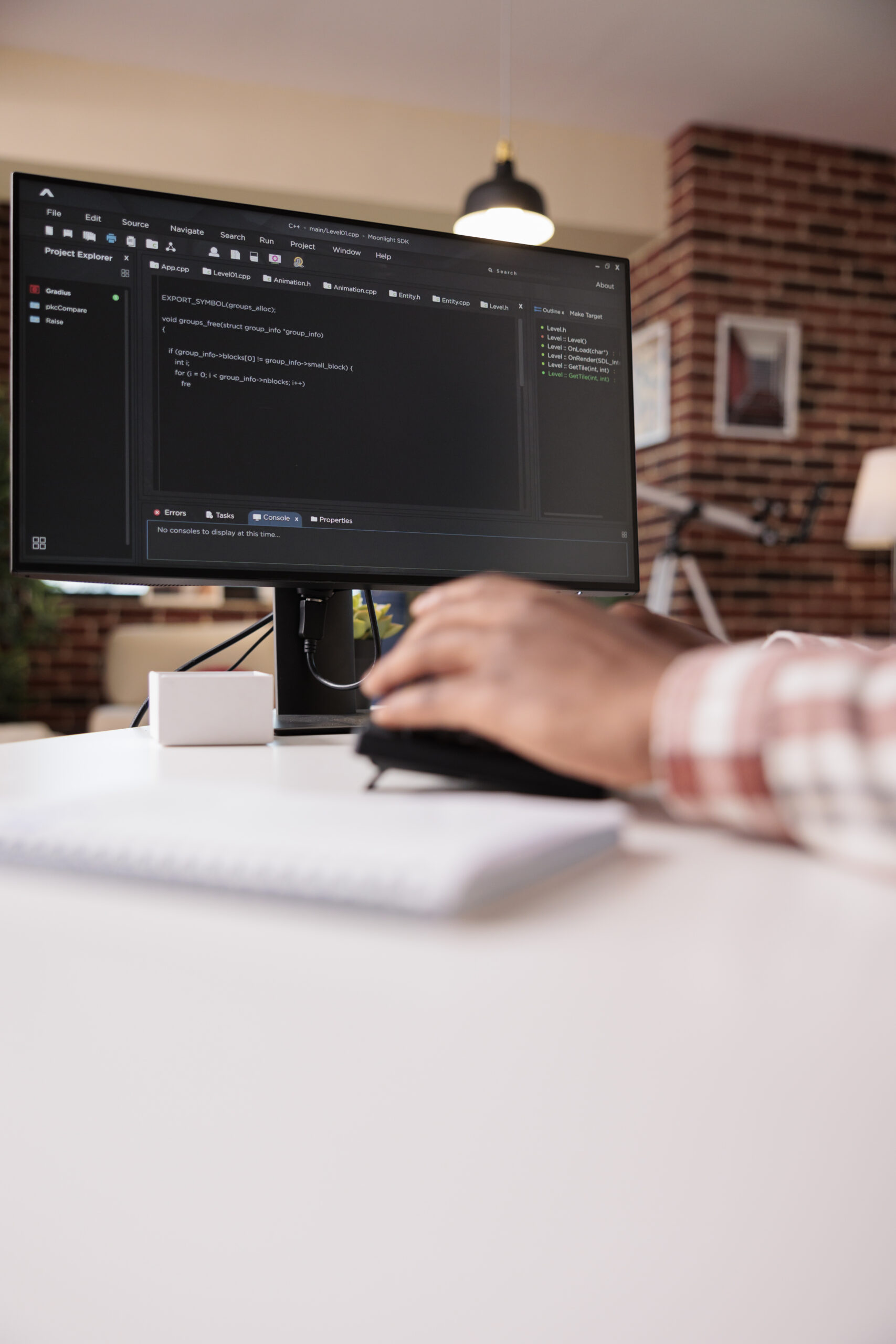 selective focus on computer screen of african american programmer working remote from home